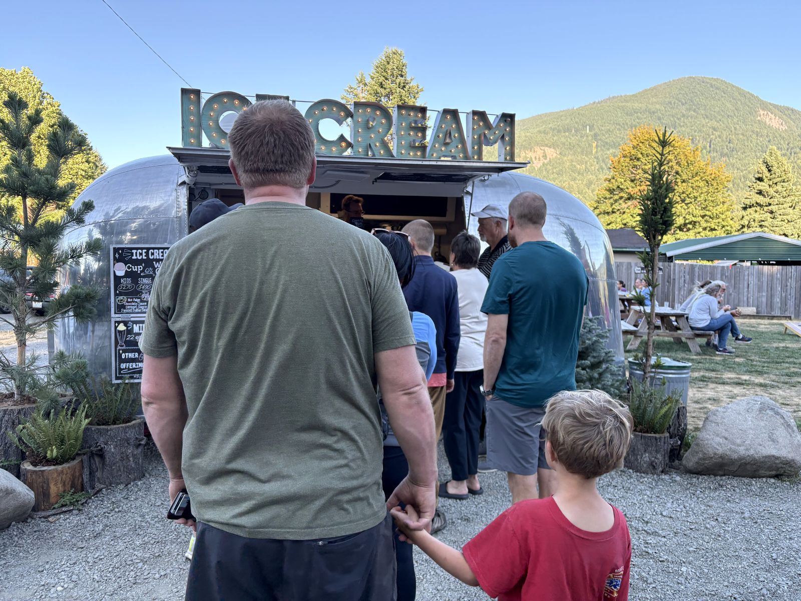 Waiting in line at the ice cream trailer during Packwood's outdoor concert night