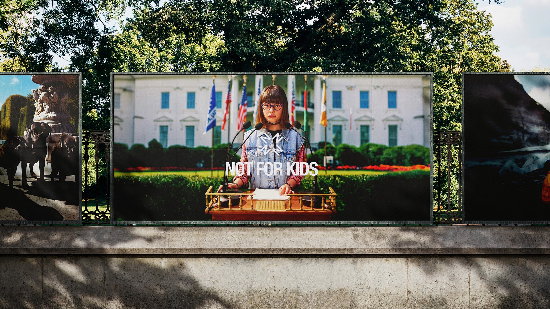 Streetside billboard with flyposters of the Batch.Works brand and illustrations