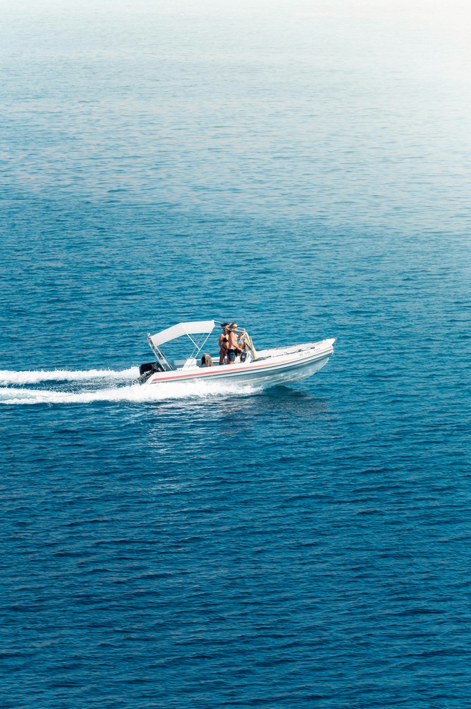 Boat in water speeding at sadler point