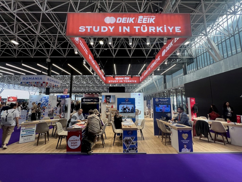 Wide view of the DEİK Study in Türkiye pavilion at EAIE Toulouse, showing the 108 sqm space with university display zones.