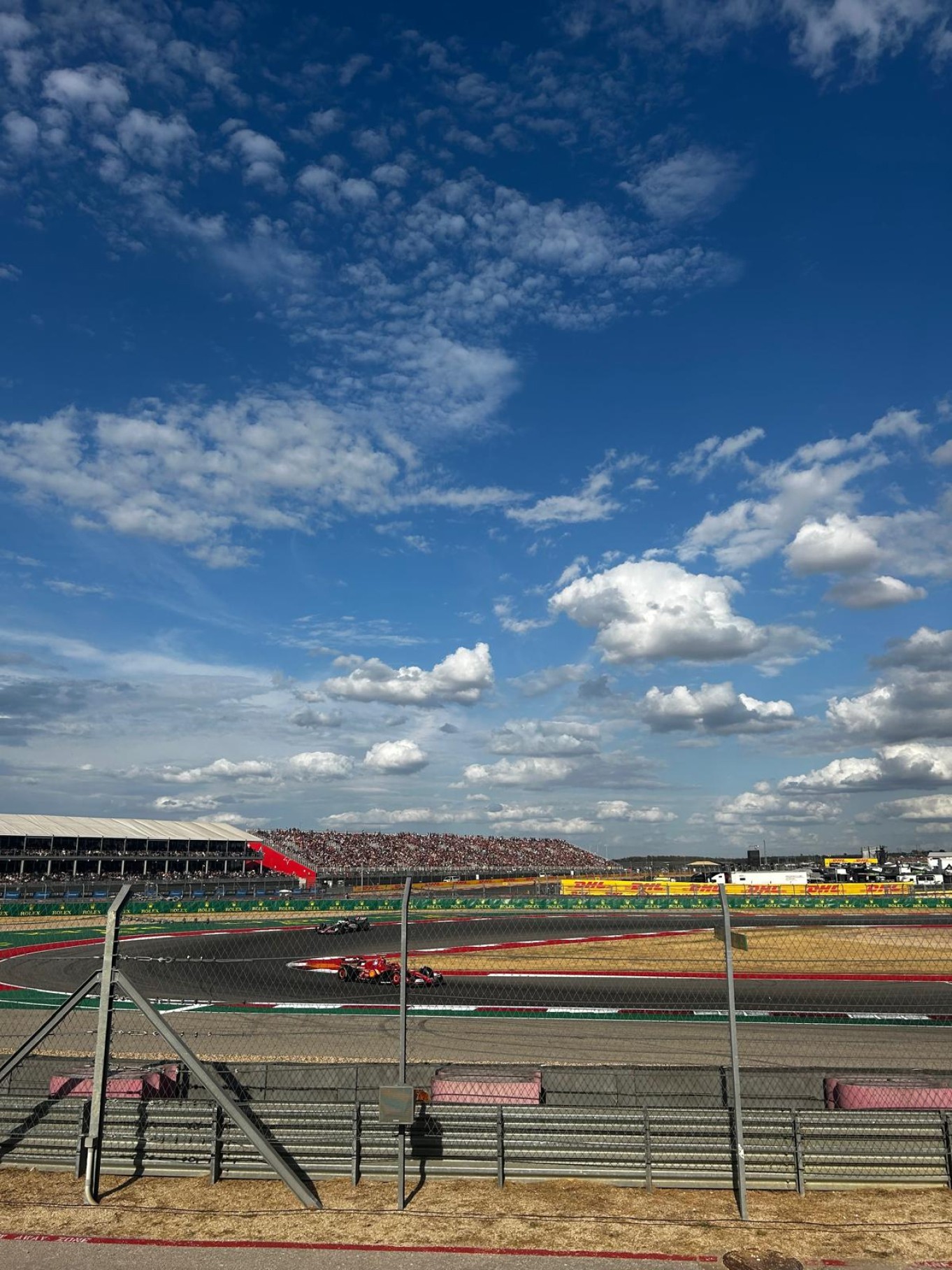 people in a large building with Tate Modern in the background