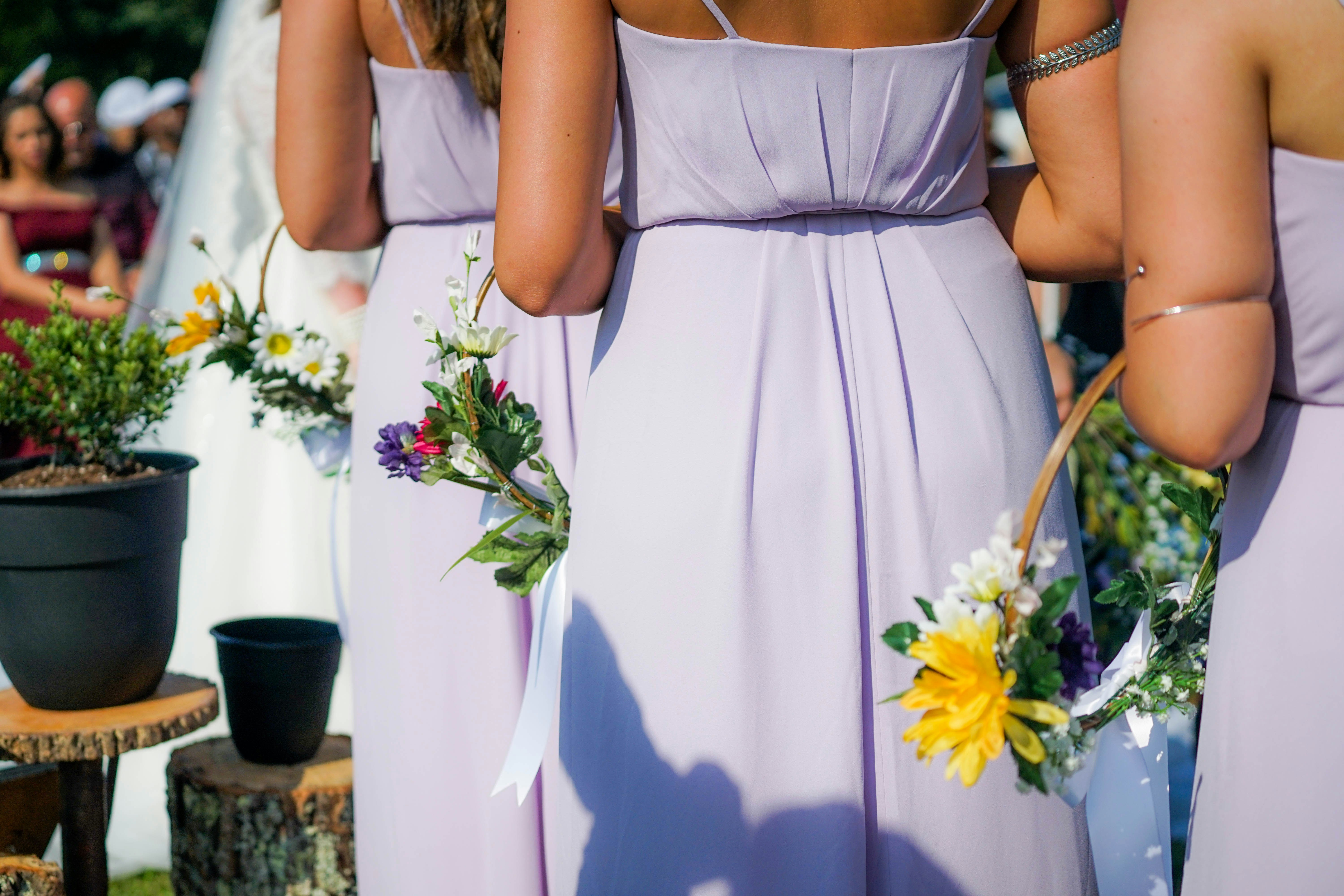 Girls holding Flowers-  Fall Wedding Outfits