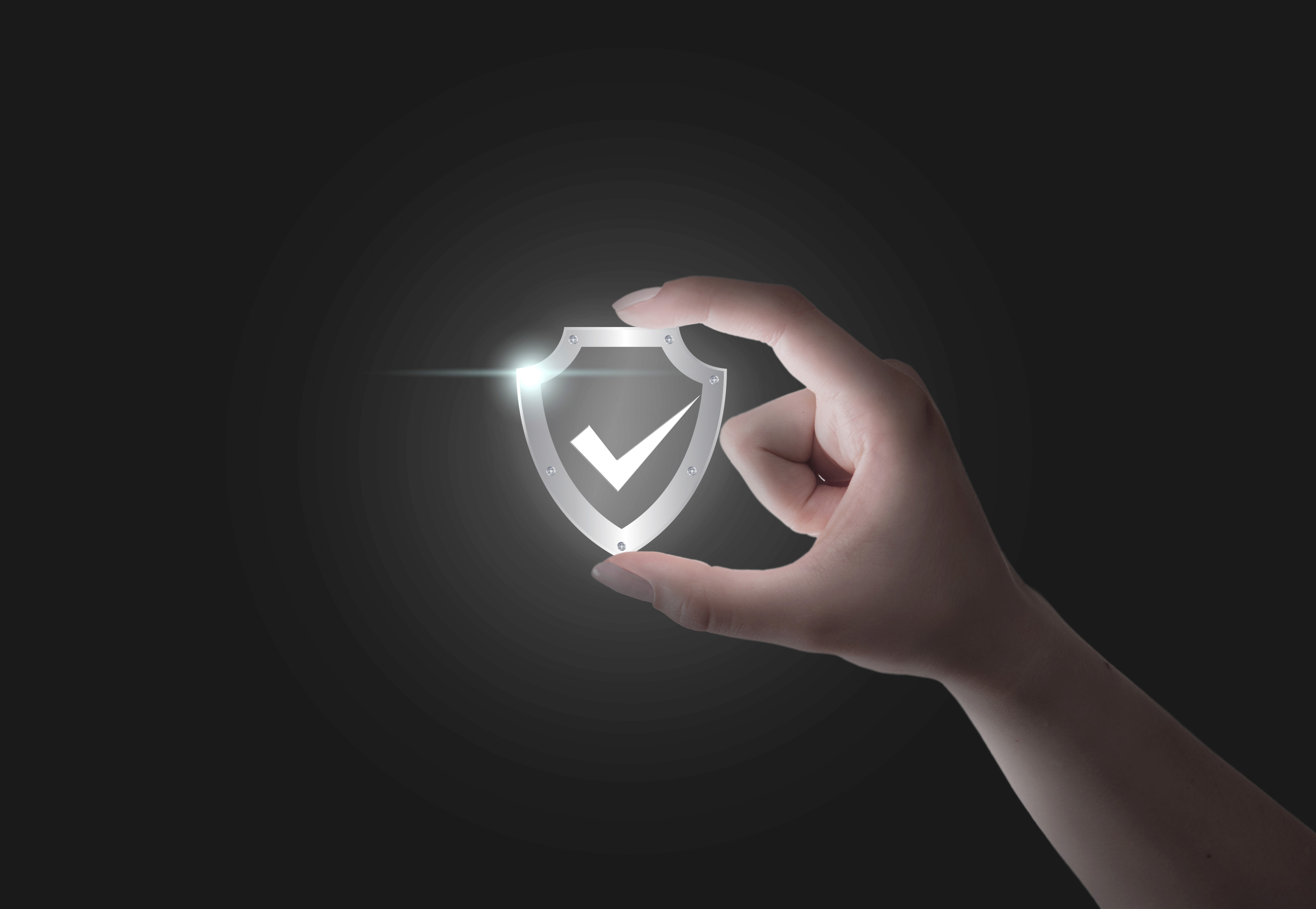 man wearing gray polo shirt beside dry-erase board