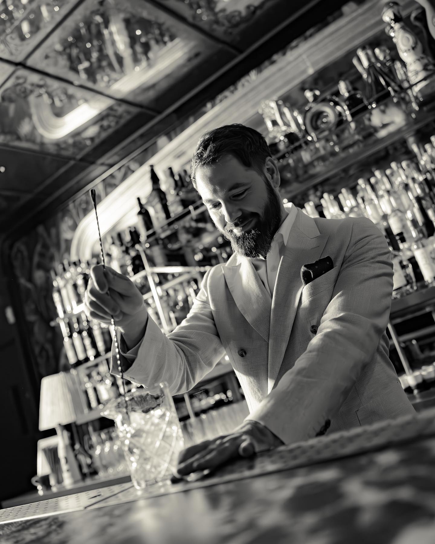 two people looking at a tablet and smiling