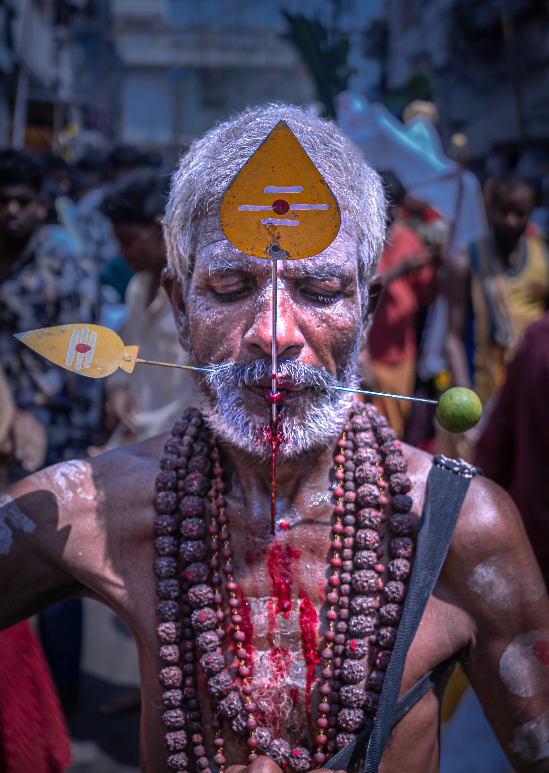 Silence Sealed by Steel — A devotee transcends the limits of the flesh, offering his pain as the ultimate prayer in the trance of Thaipusam.