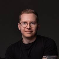 selective focus of man smiling during daytime