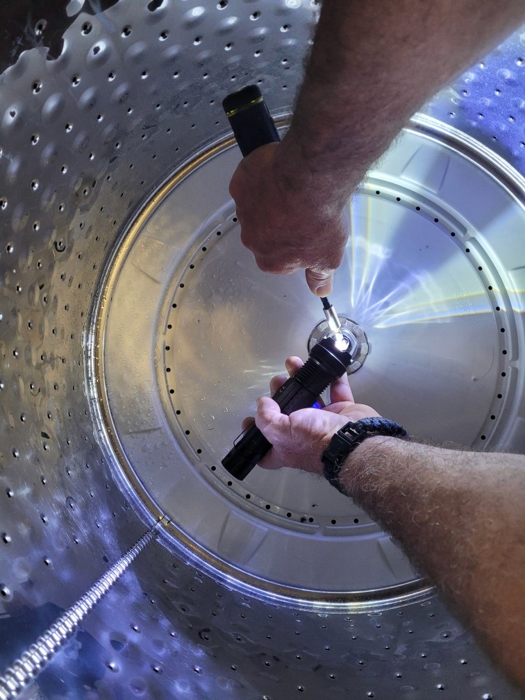 Working on top load washer