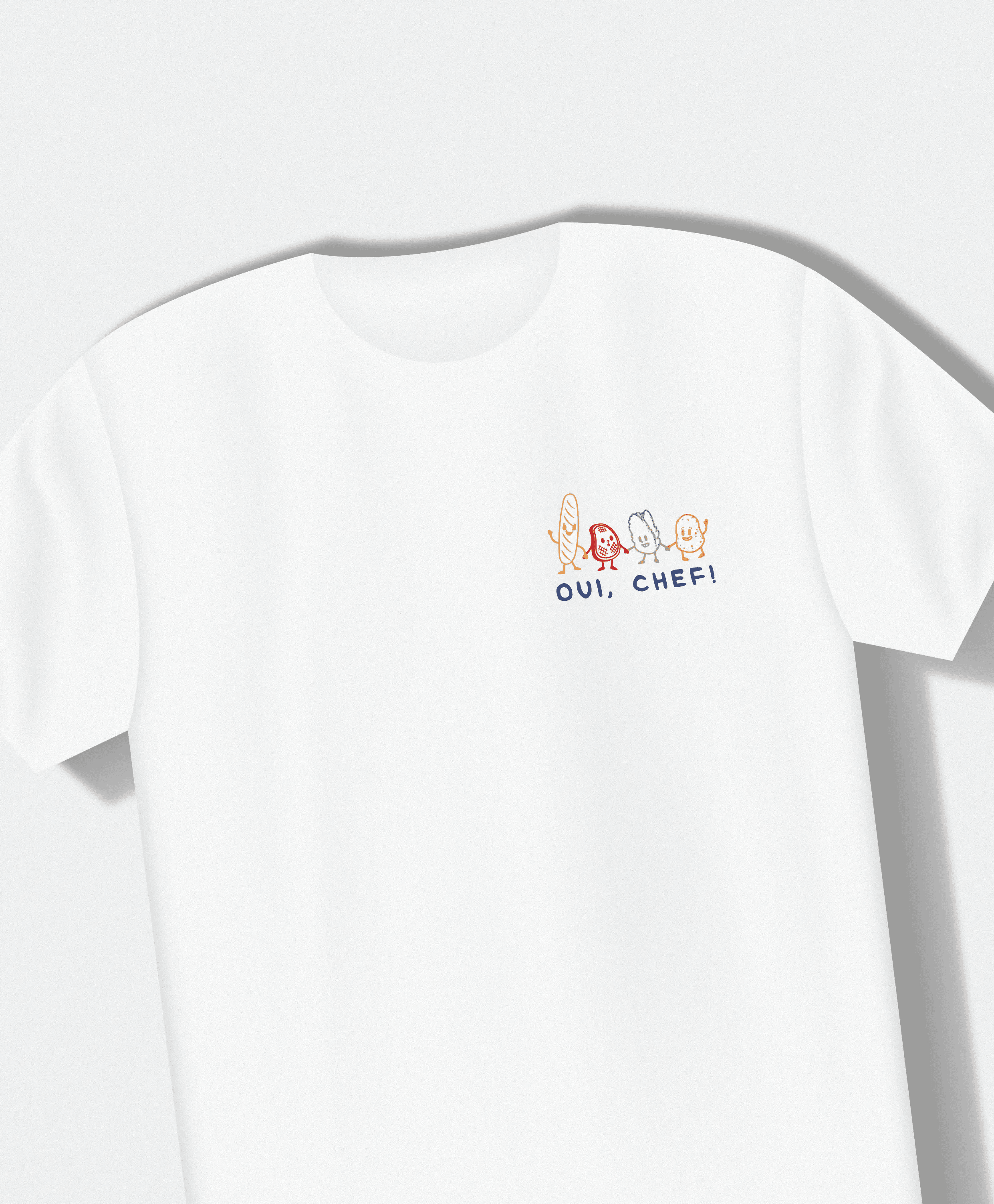 The front of the shirt with a small graphic of the food characters holding hands and the slogan "Oui, Chef" underneath