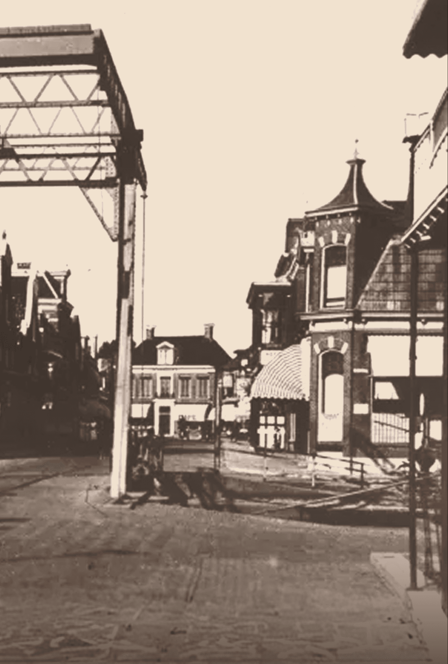 Restaurant bar with guests seated at tables and bartenders at work.