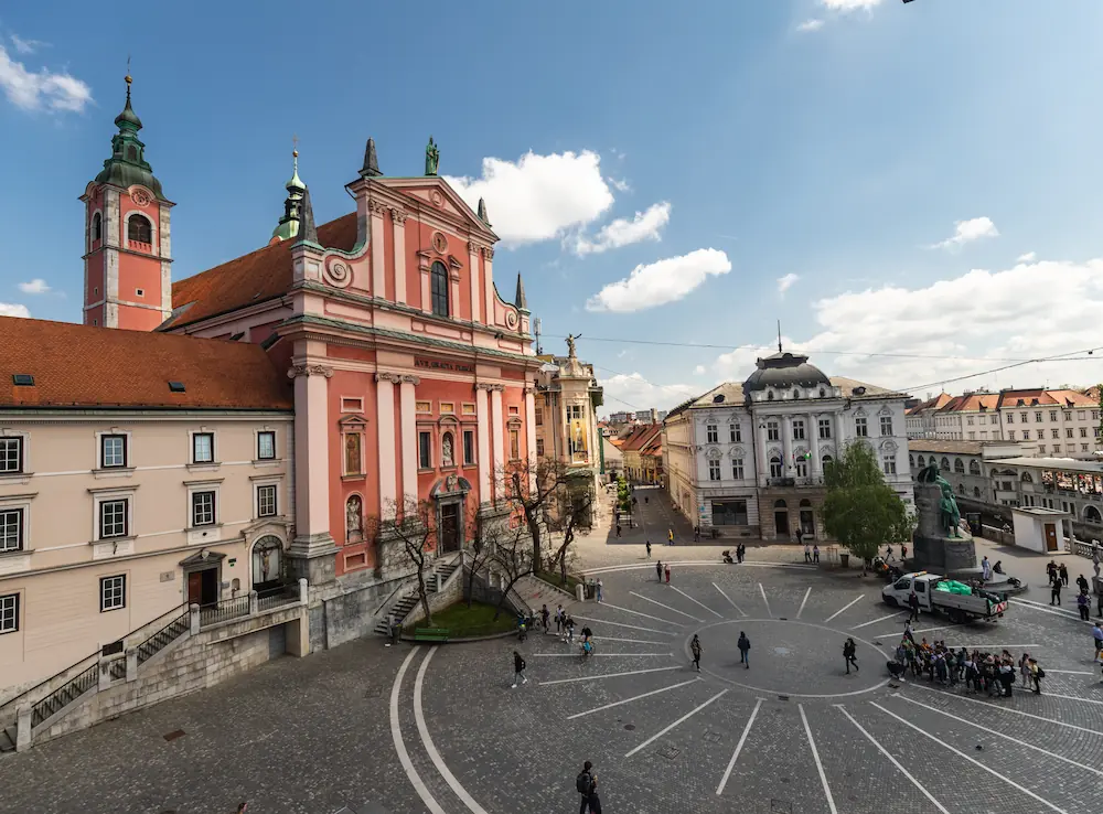 Ljubljana cathedral looking over Prešeren square in Ljubljana city center on a summer afternoon.