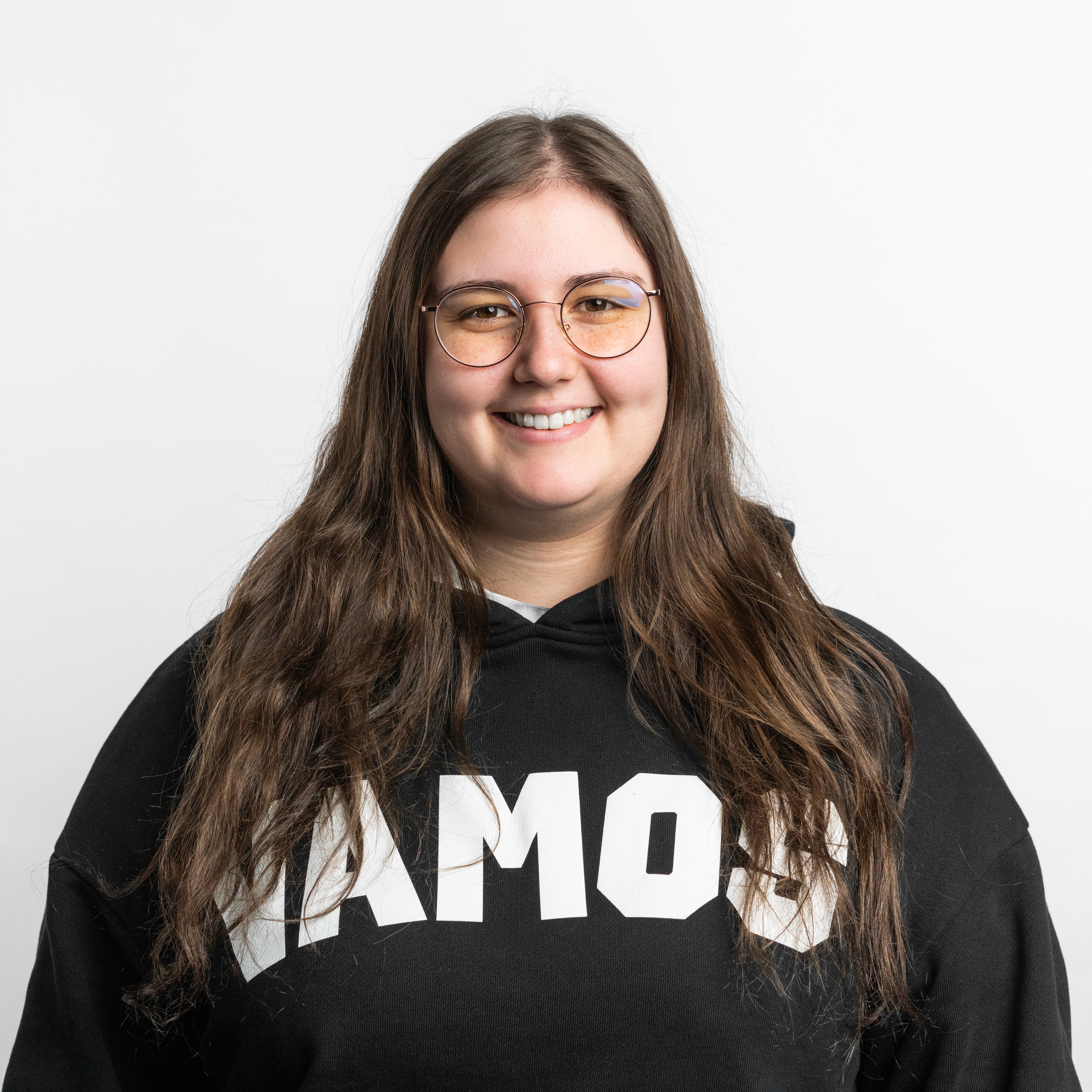 headshot of female in bright background