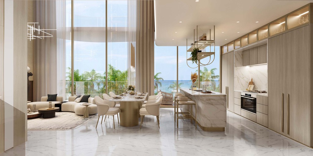 A modern living room with ocean views at sunset bay, Dubai, featuring contemporary furniture and warm lighting.