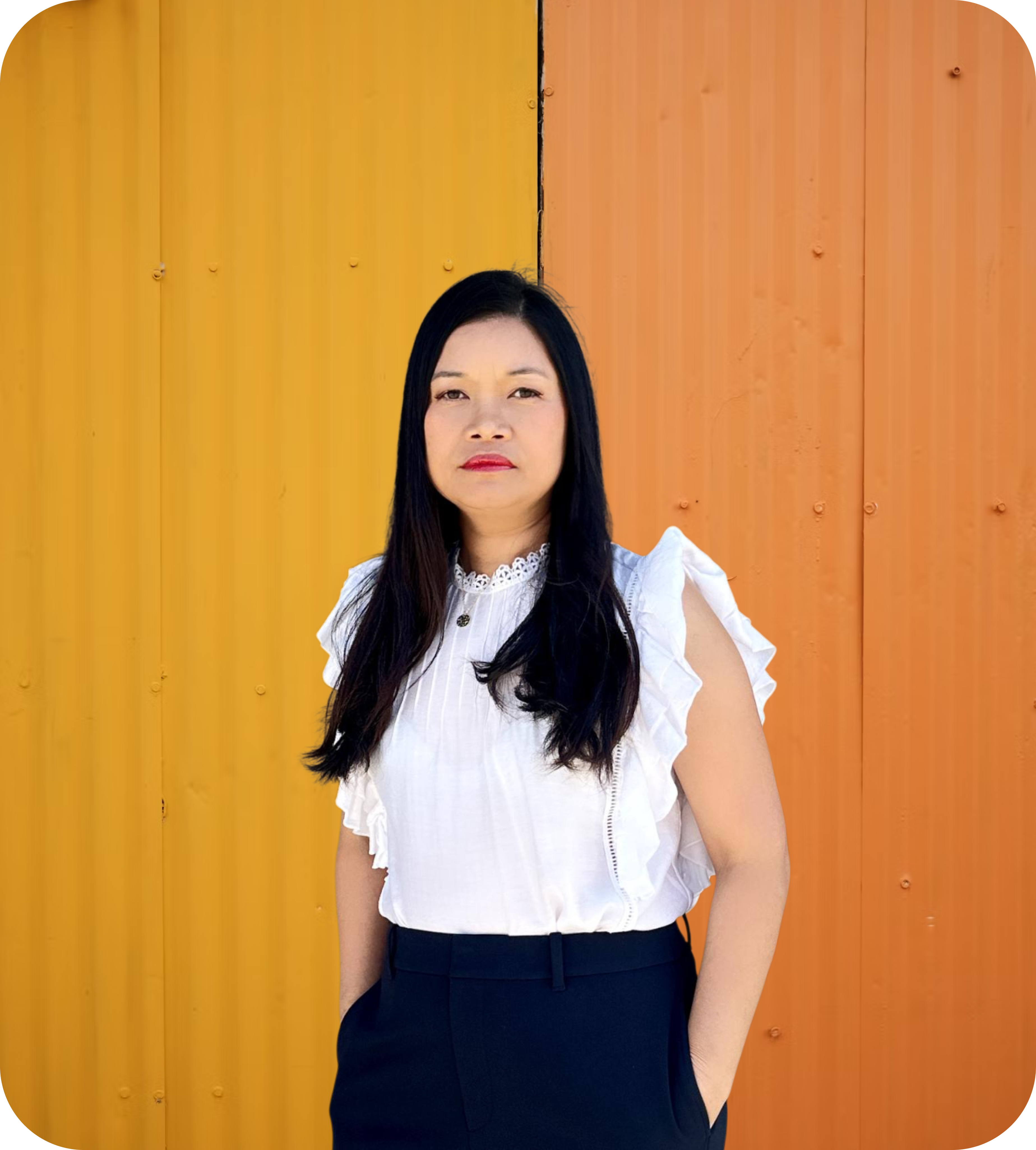 man with pen writing on wall