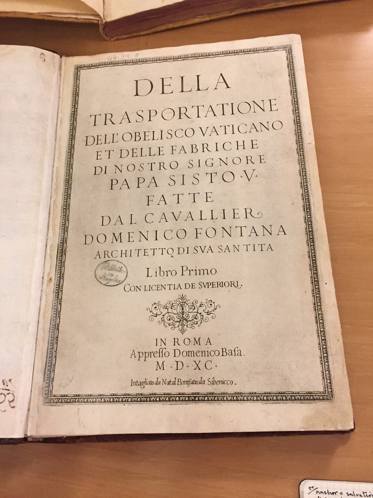 Text written on the cover of an old book.
