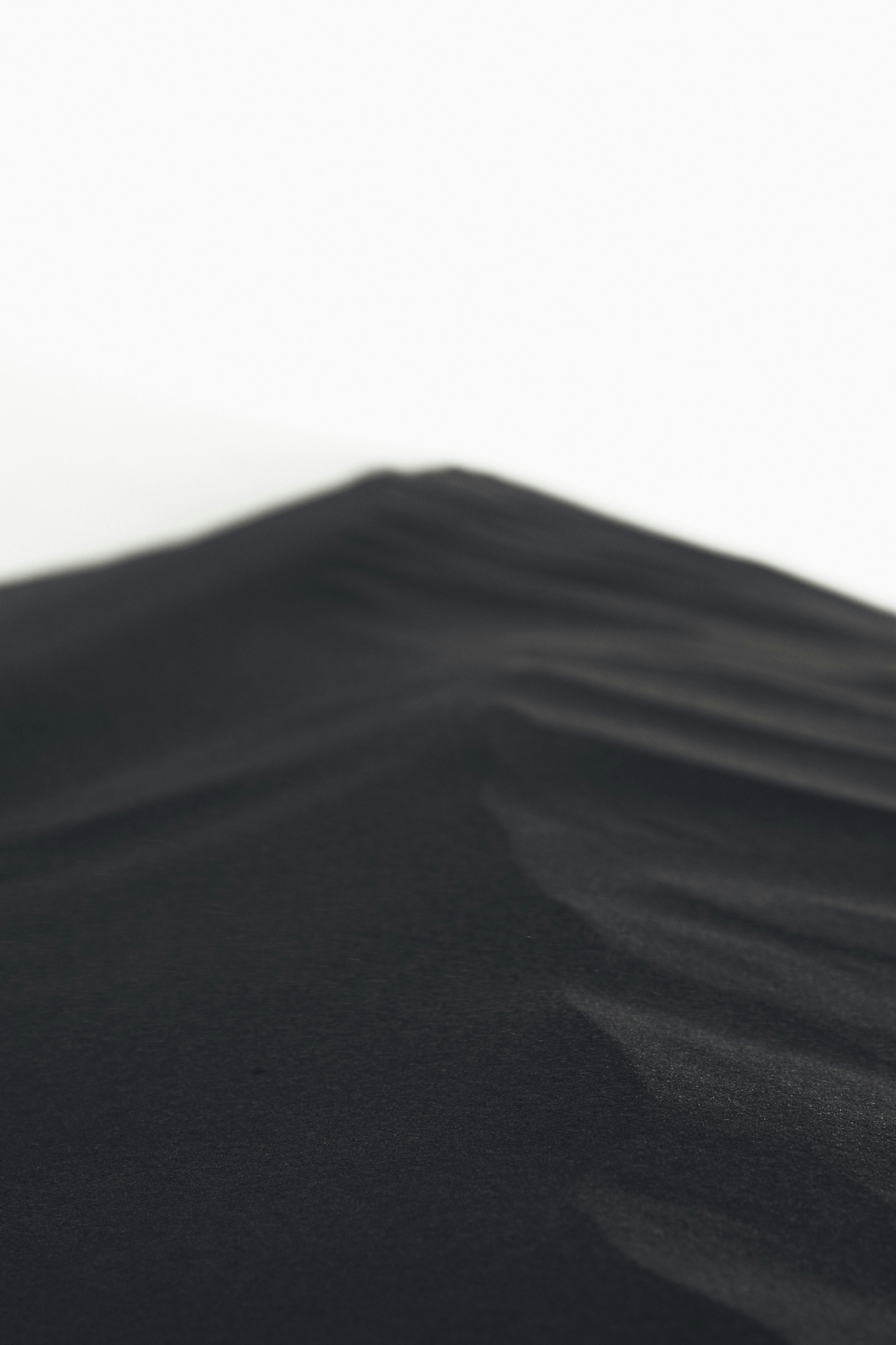 A photo of a desert sand dune.