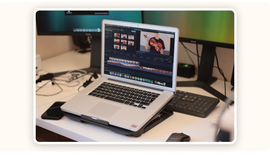 Laptop displaying video editing software