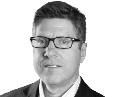 Man portrait with glasses in a suit