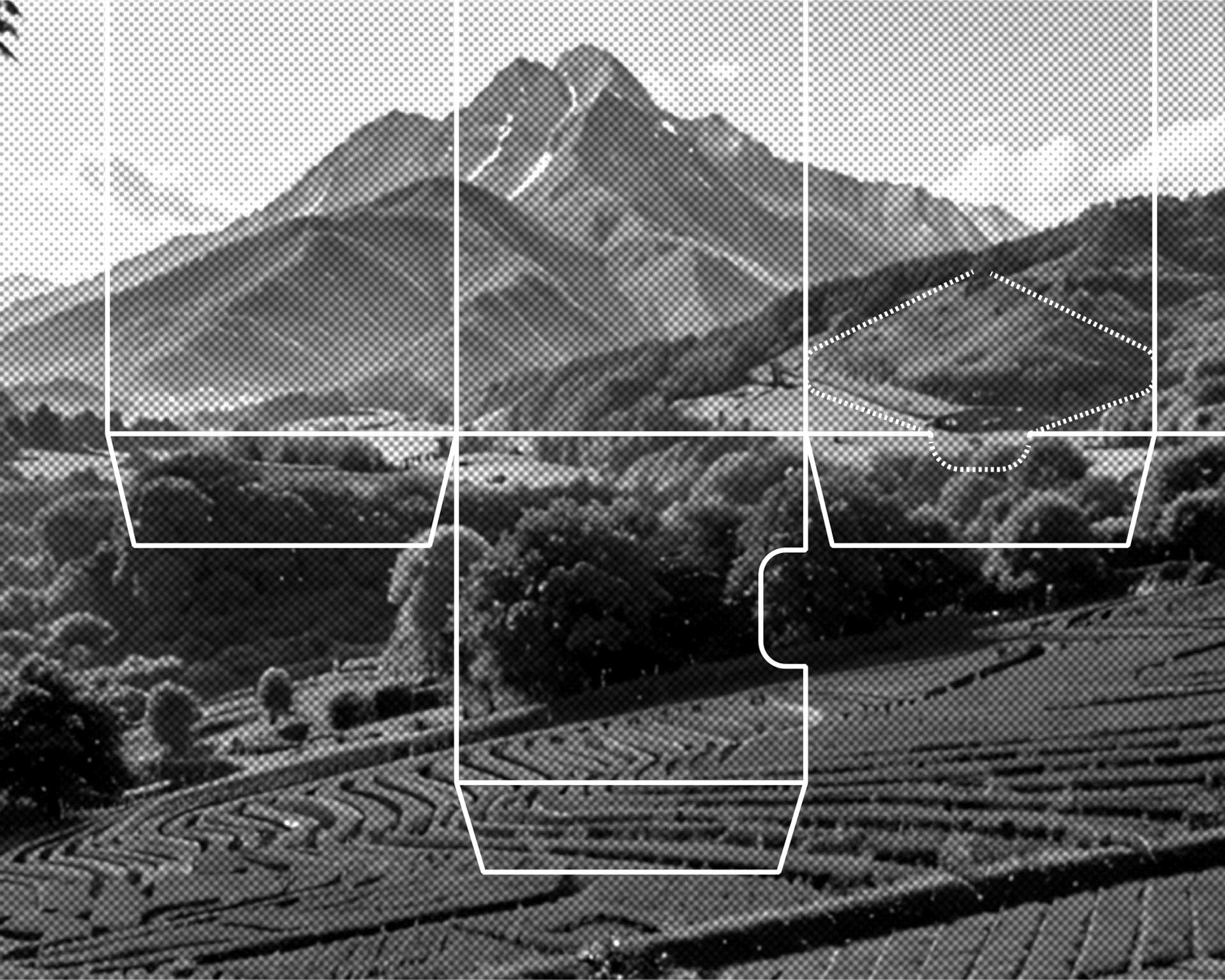 A serene landscape features terraced rice fields in the foreground, lush green hills in the middle ground, and a majestic mountain range under a partly cloudy sky in the background.