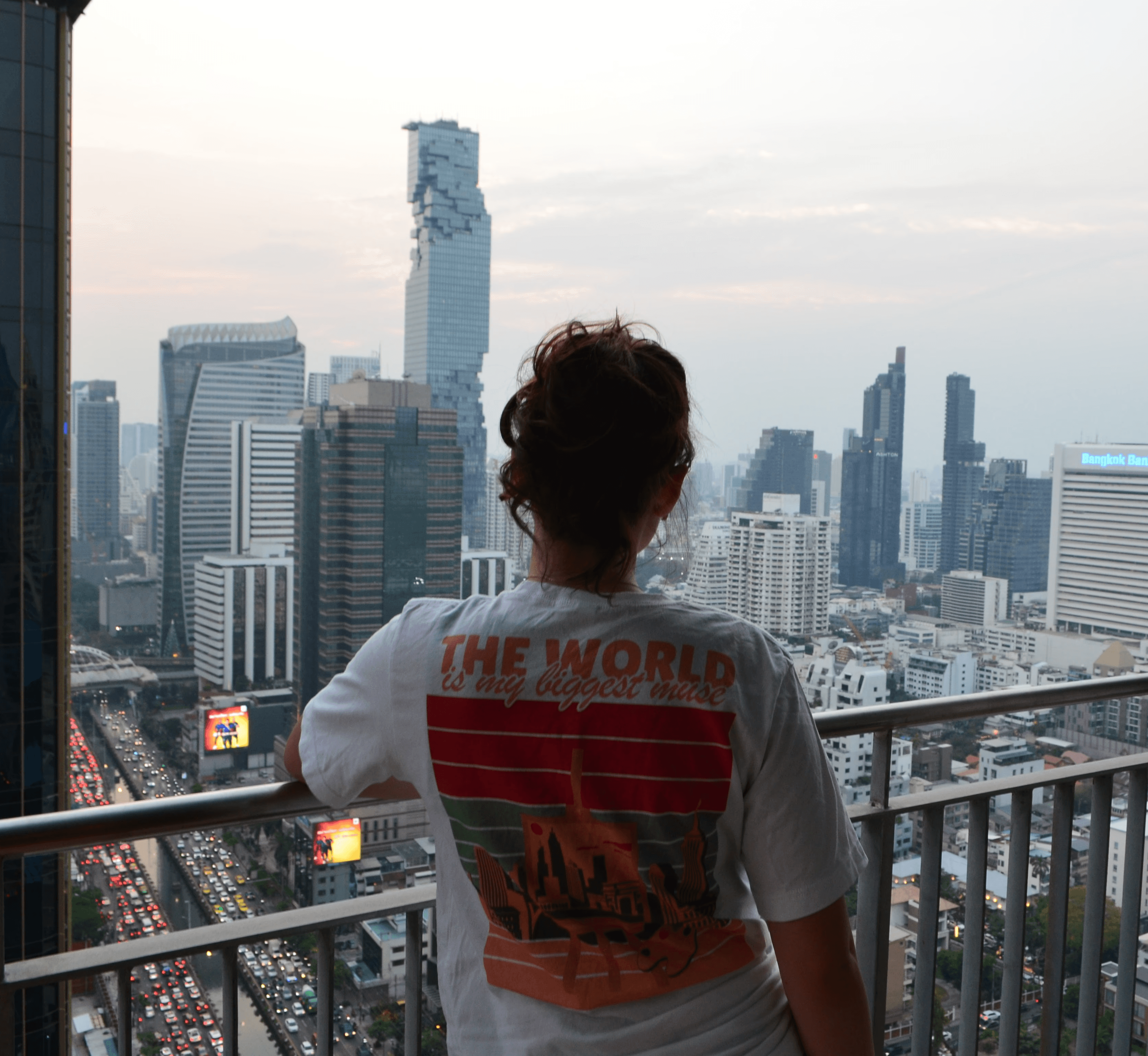 Close-up of a tree stump showing growth rings and a textured brown wood surface.