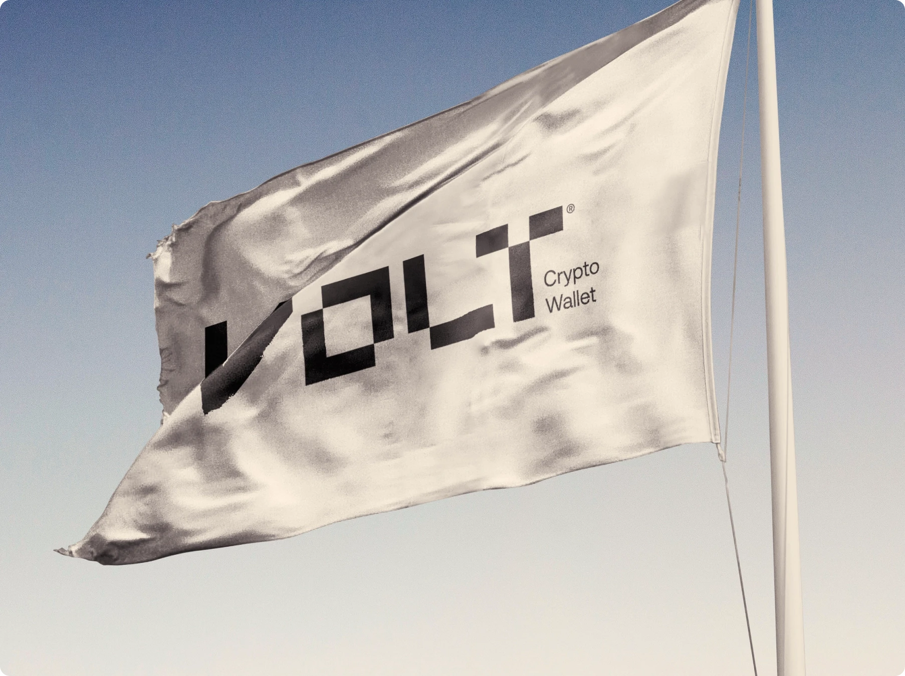 White flag waving against a clear blue sky, featuring a bold black crypto wallet logo and text; conveys a calm, minimalist tone.