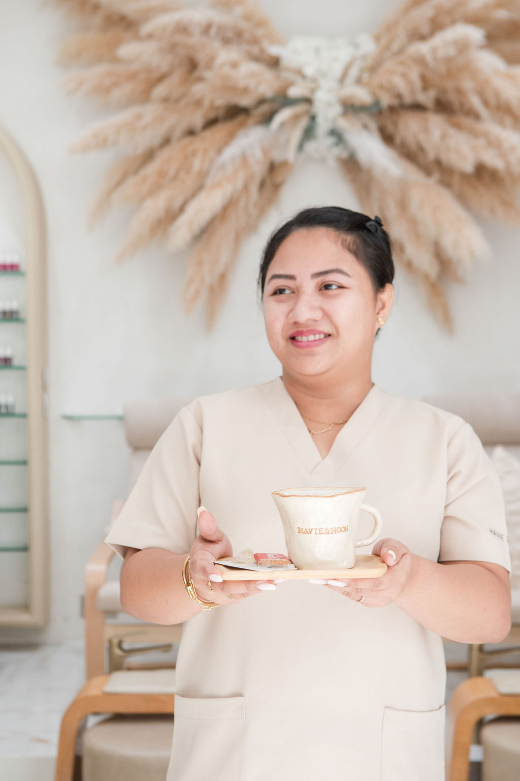 Client experience at Havie & Moon Dubai Hills salon, relaxing luxury atmosphere with modern design.