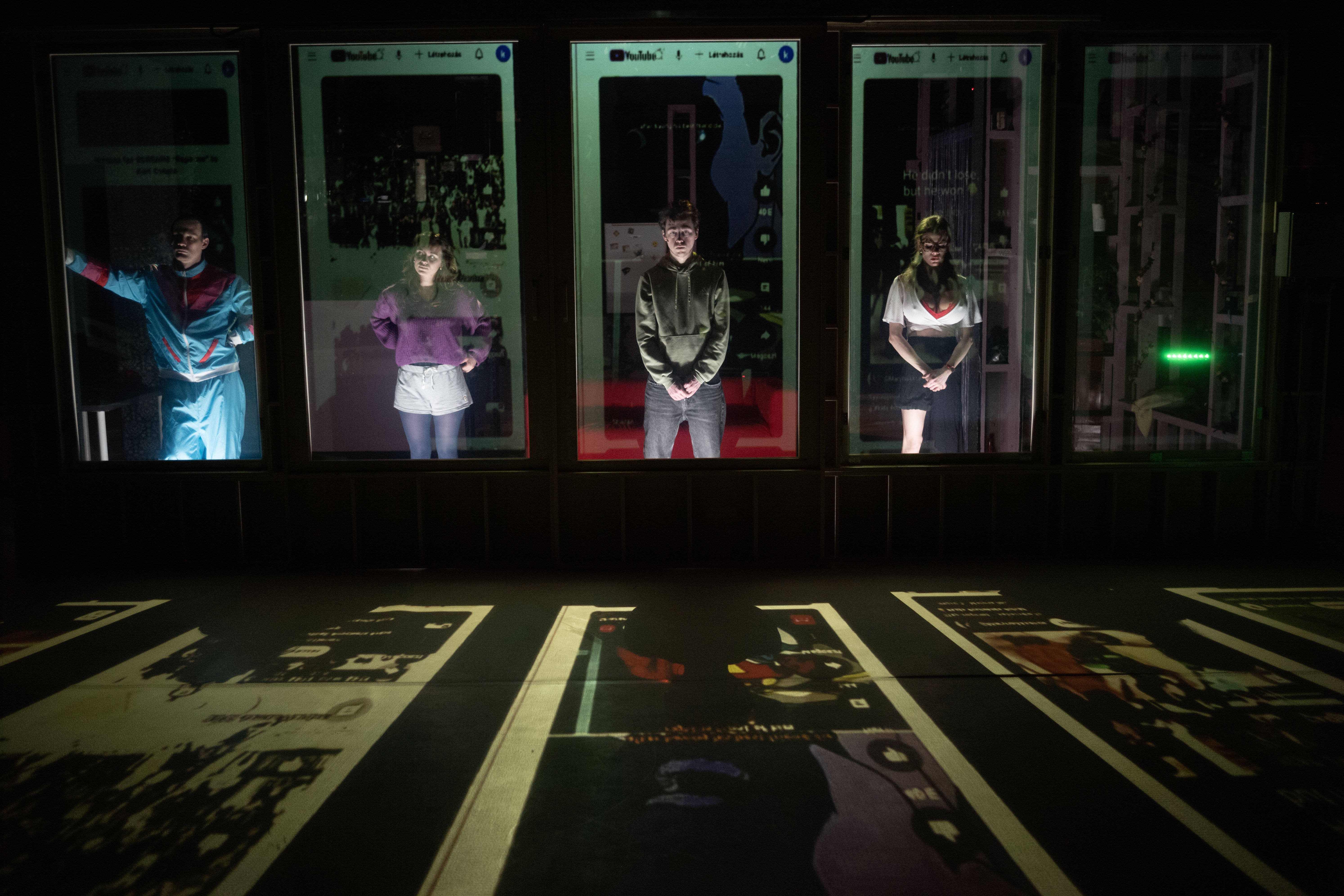 A green butterfly rests on a flower.