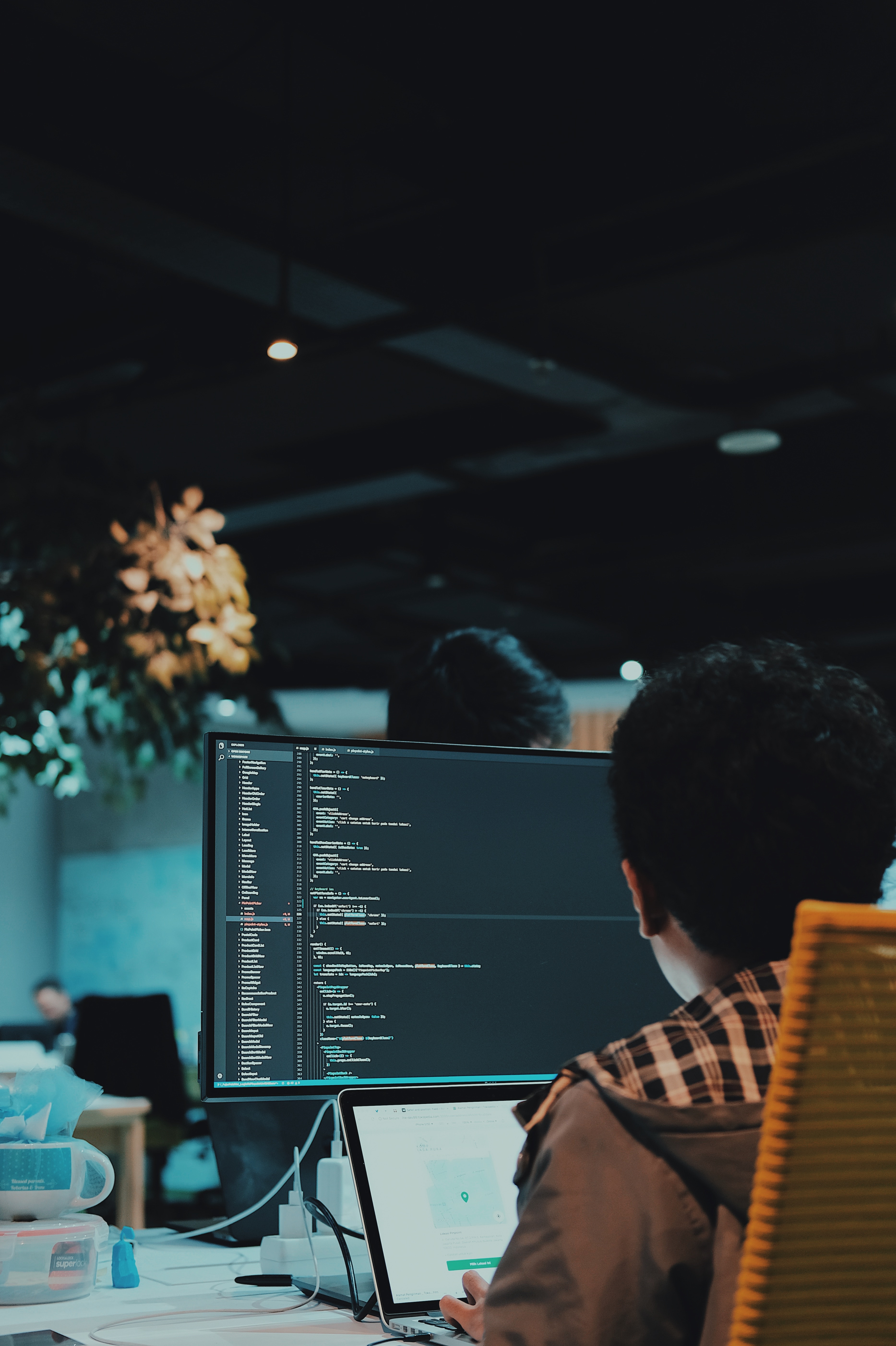 A man coding on my computer