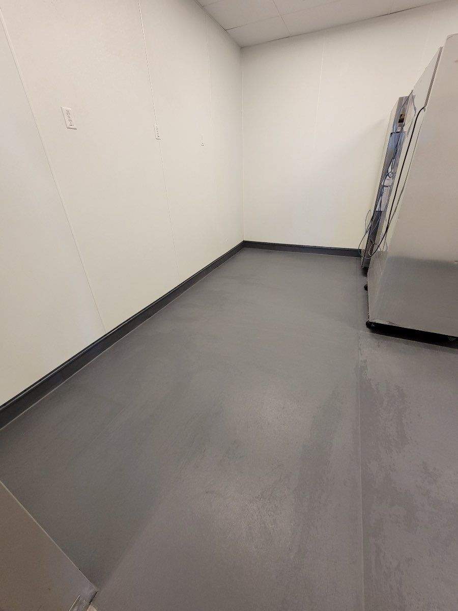 Completed Eco-Grip project showing consistent tone and seamless transition from floor to wall base.