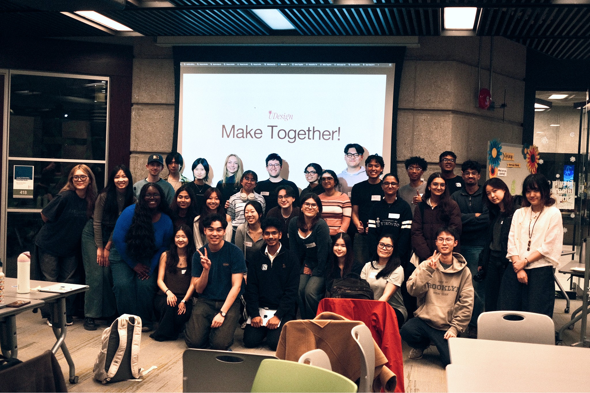 a group of people walking on a sidewalk