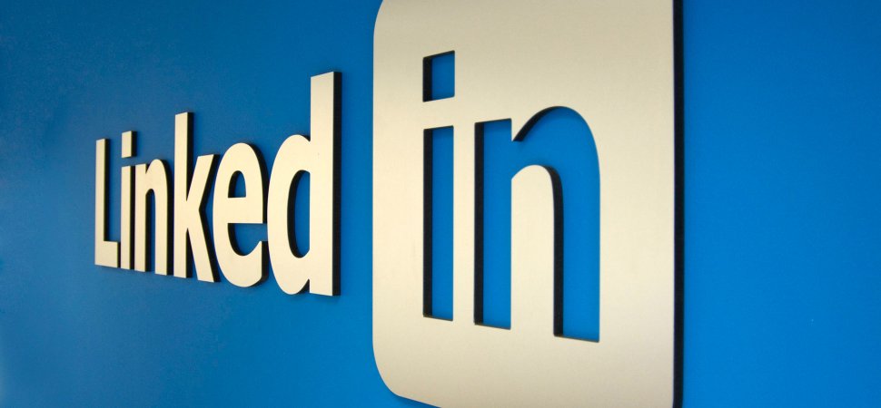  LinkedIn logo displayed on a blue background, featuring bold white lettering and a professional, minimalist design.