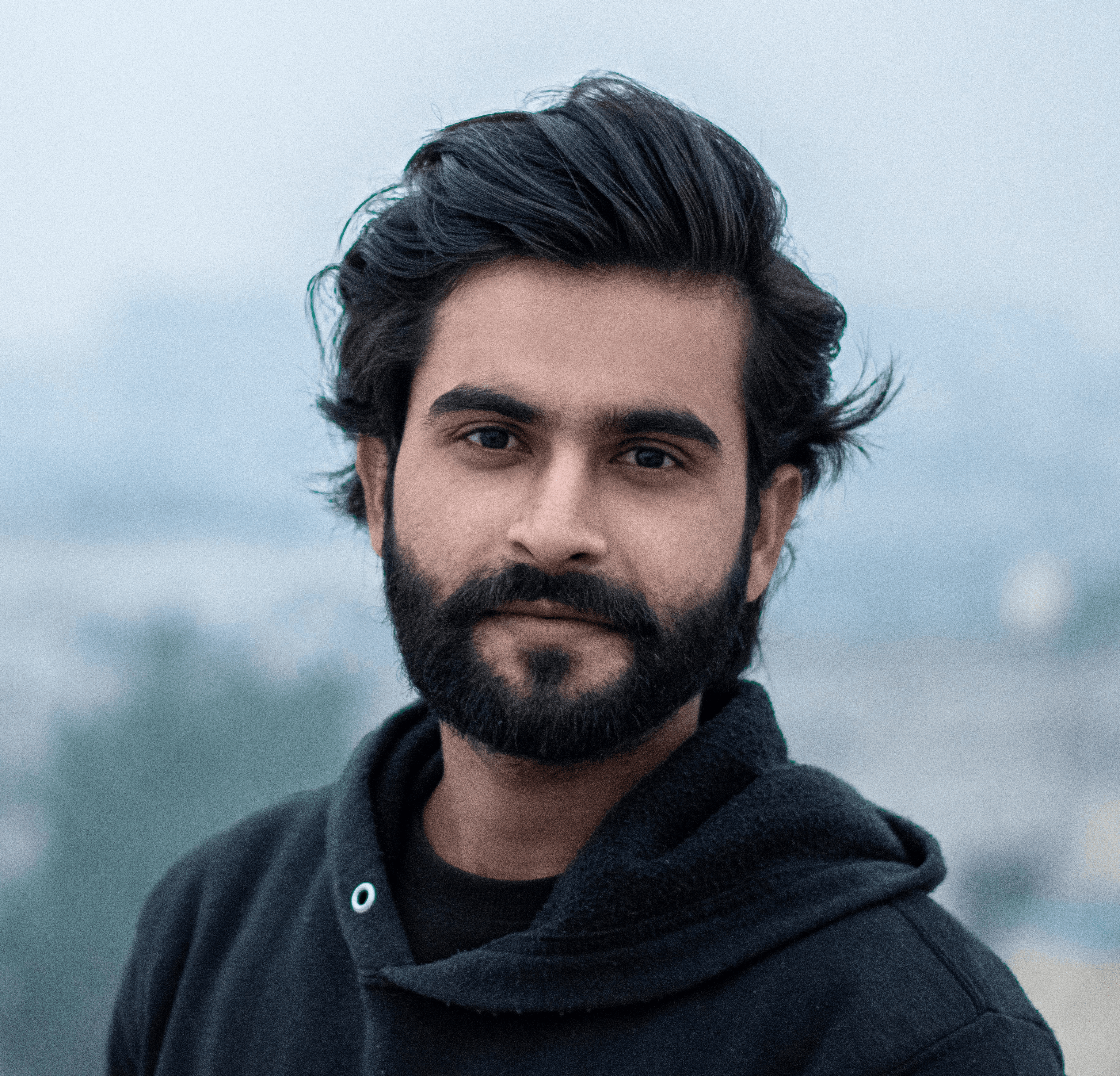 man in black zip up jacket