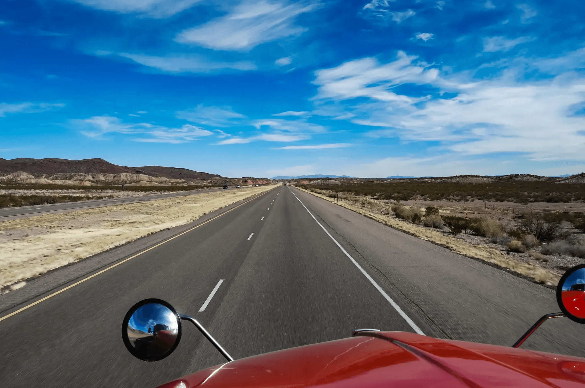 Highway view from a commercial truck during a long-haul trip