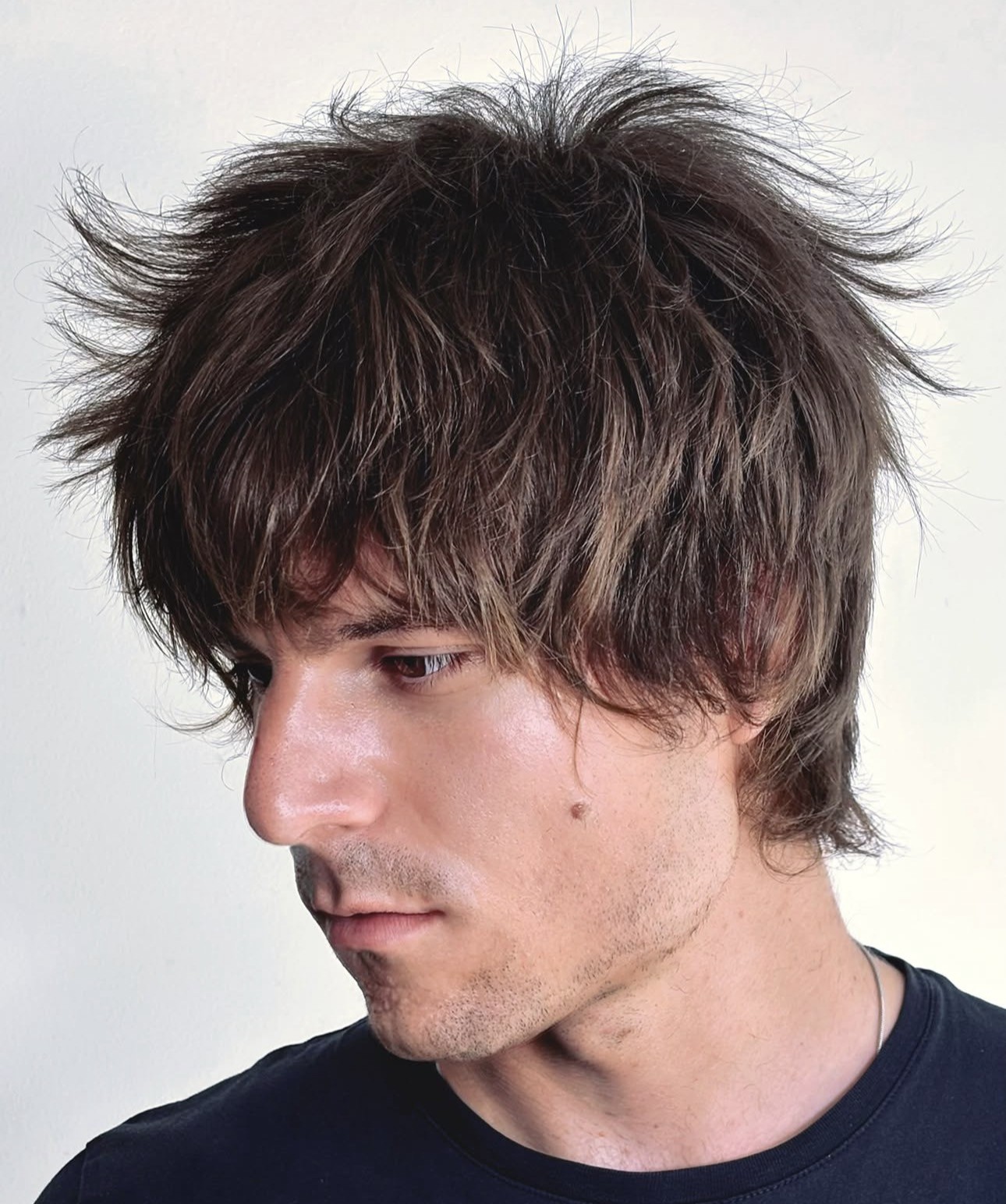 Textured layered haircut with long fringe