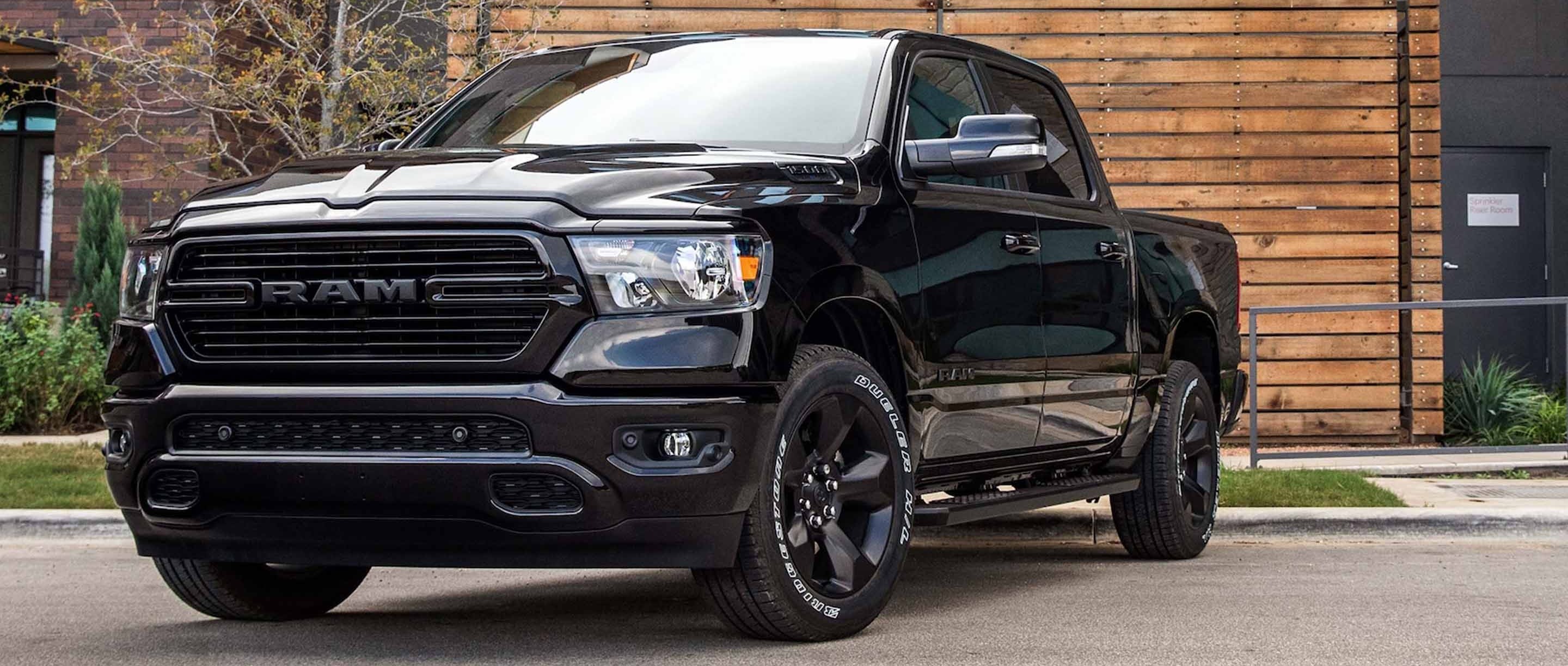 Ram 1500 pickup truck on a crowded urban street, illustrating potential safety concerns for pedestrians