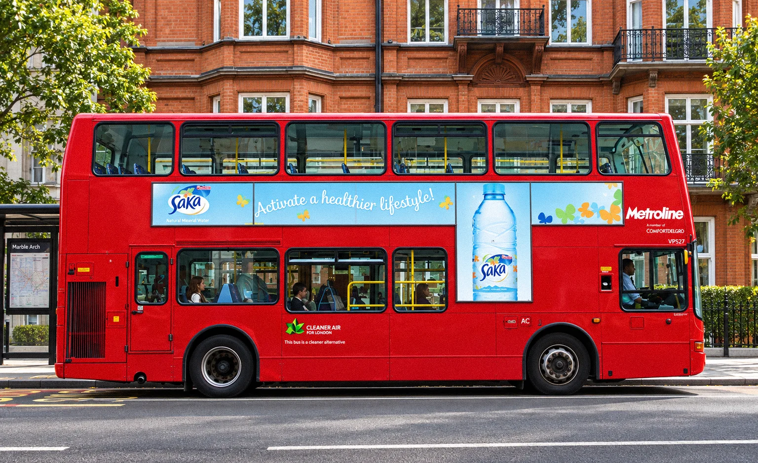 Saka water ad on the side of a red Metroline double-decker bus in London promoting "Activate a healthier lifestyle!"