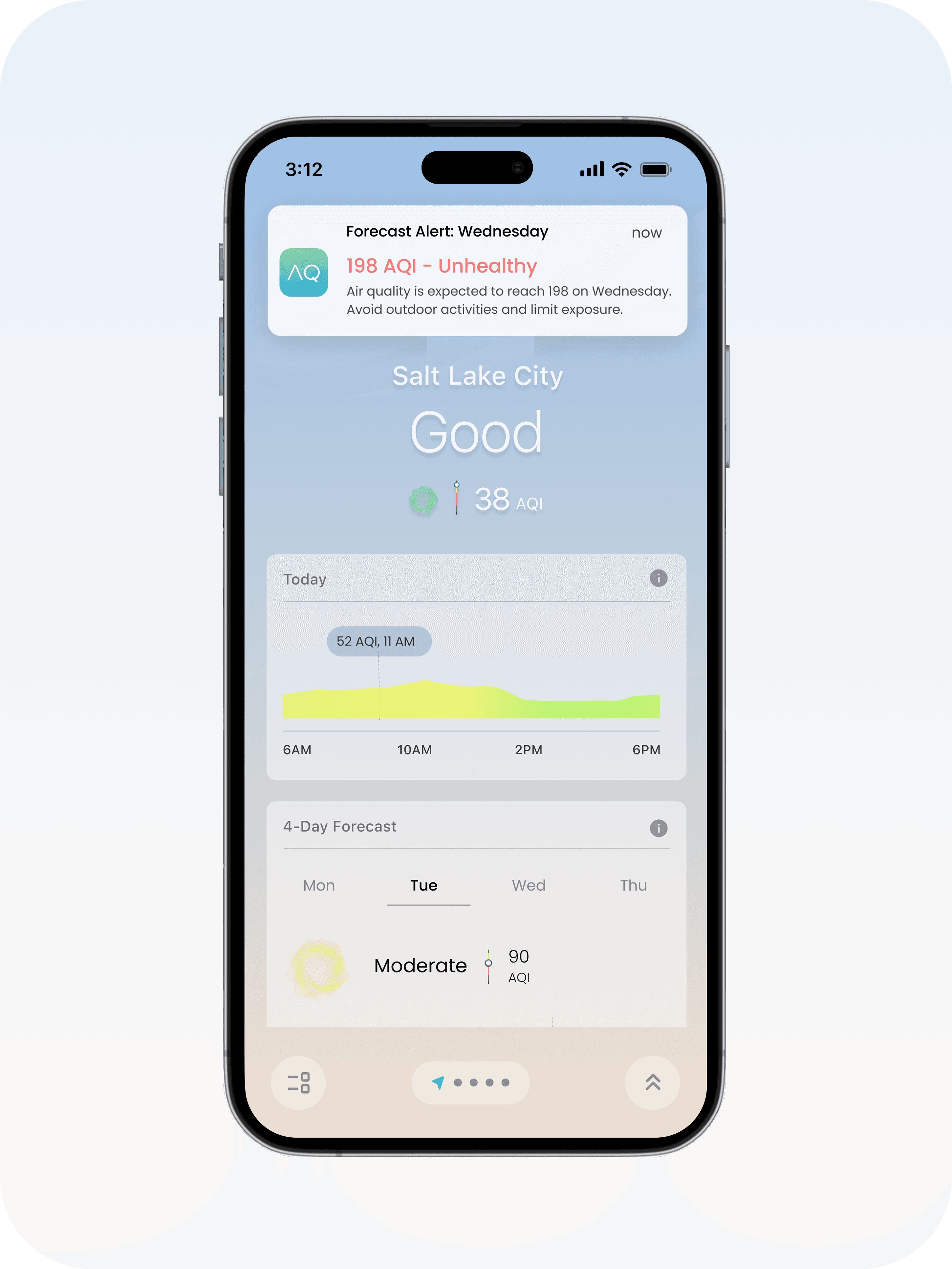 Aerial view of a winding road cutting through rocky terrain and sandy landscape.