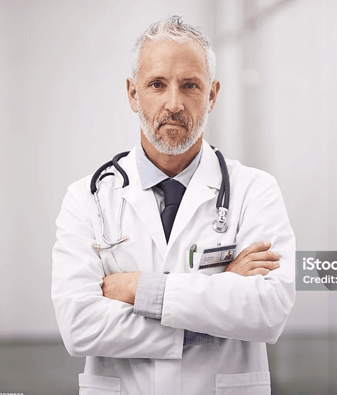 man standing beside wall