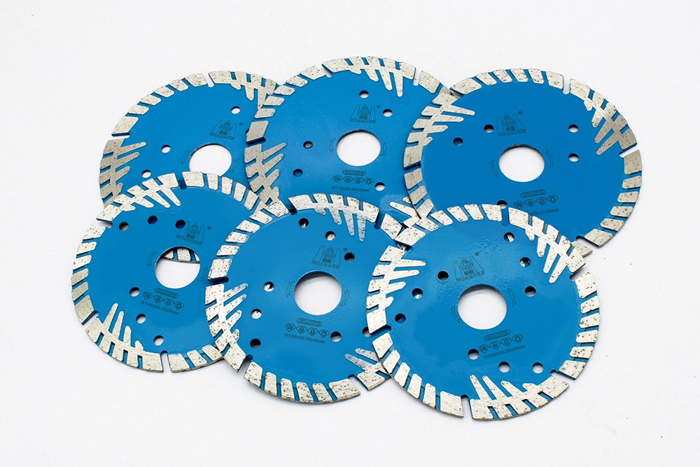 Group of Sintered Segmented Bevel Turbo Blades arranged together, showcasing their uniform design.