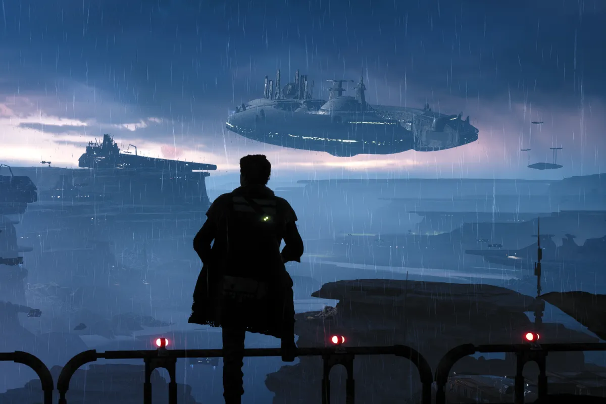 Cal Kestis stands in the rain on the scrapyard planet of Bracca, gazing at a massive Venator-class Star Destroyer being dismantled in the distance. The dark, industrial landscape is illuminated by fading twilight, setting a somber tone at the beginning of the gameplay.