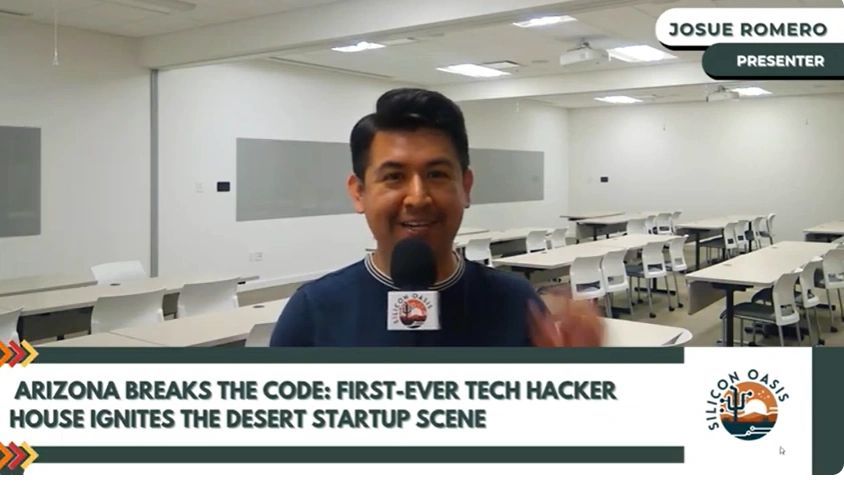 a black and white living room with a large tv