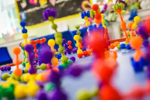 Colorful, abstract STEM building toys with a shallow depth of field.