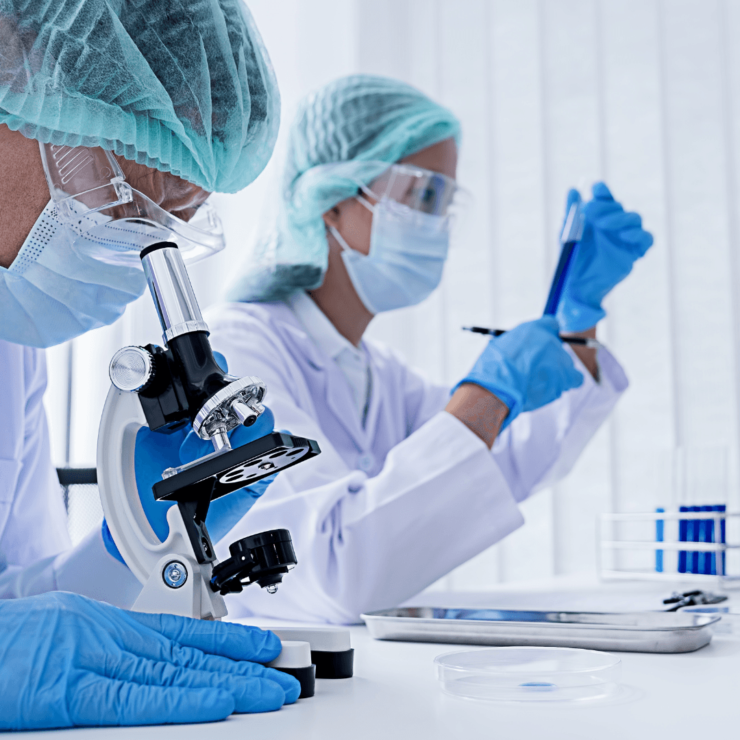 Image of lab workers at work on clinical research