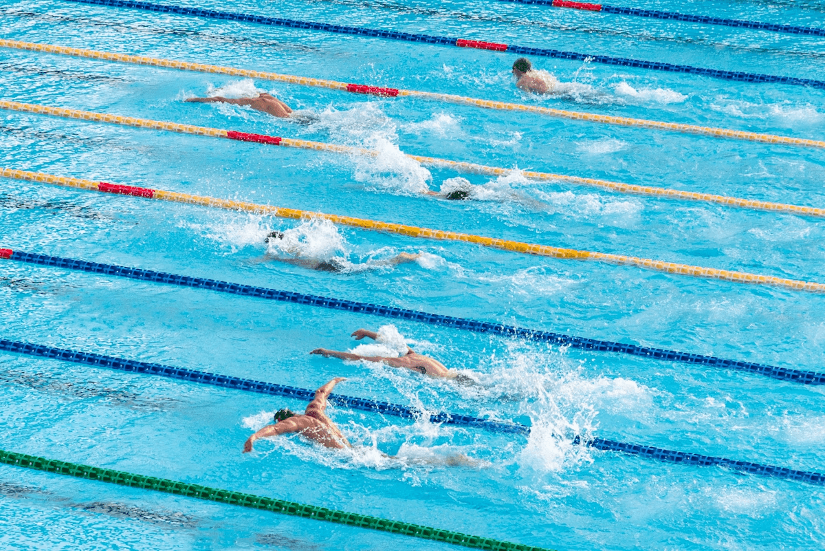 Swimmers swiming in lanes