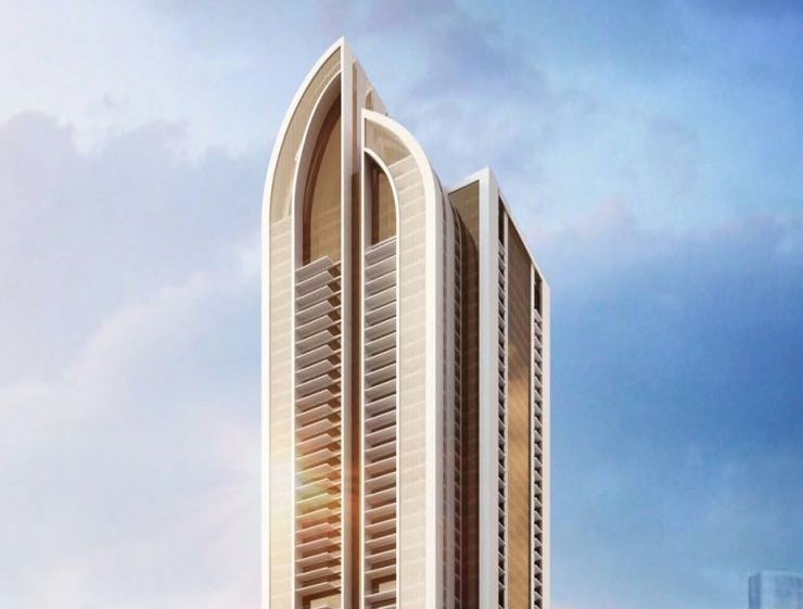 Sleek architectural design of the upper floors of a luxury skyscraper overlooking the city skyline.