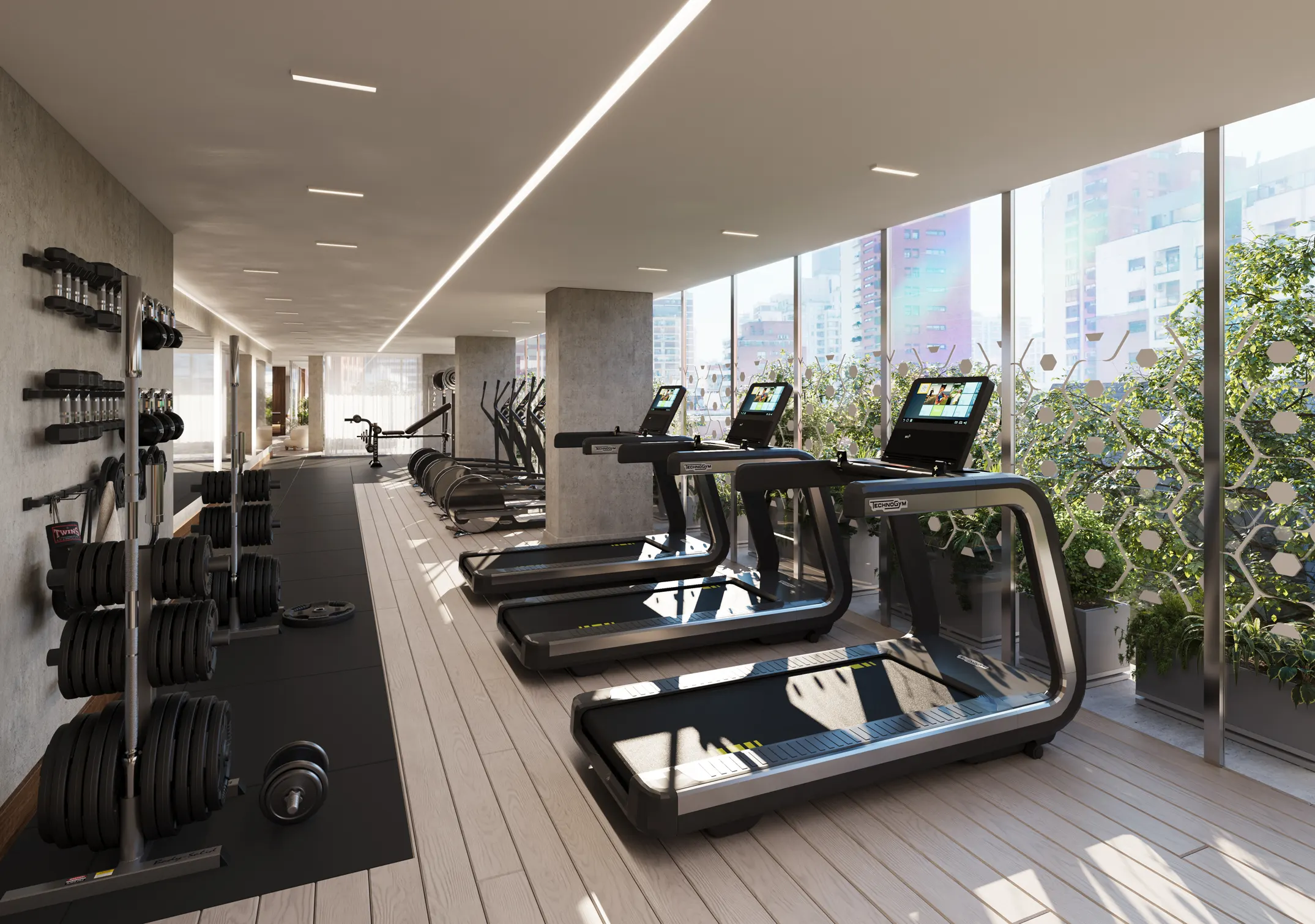 Gimnasio equipado con pista de ejercicio, cintas de correr y máquinas, con grandes ventanales