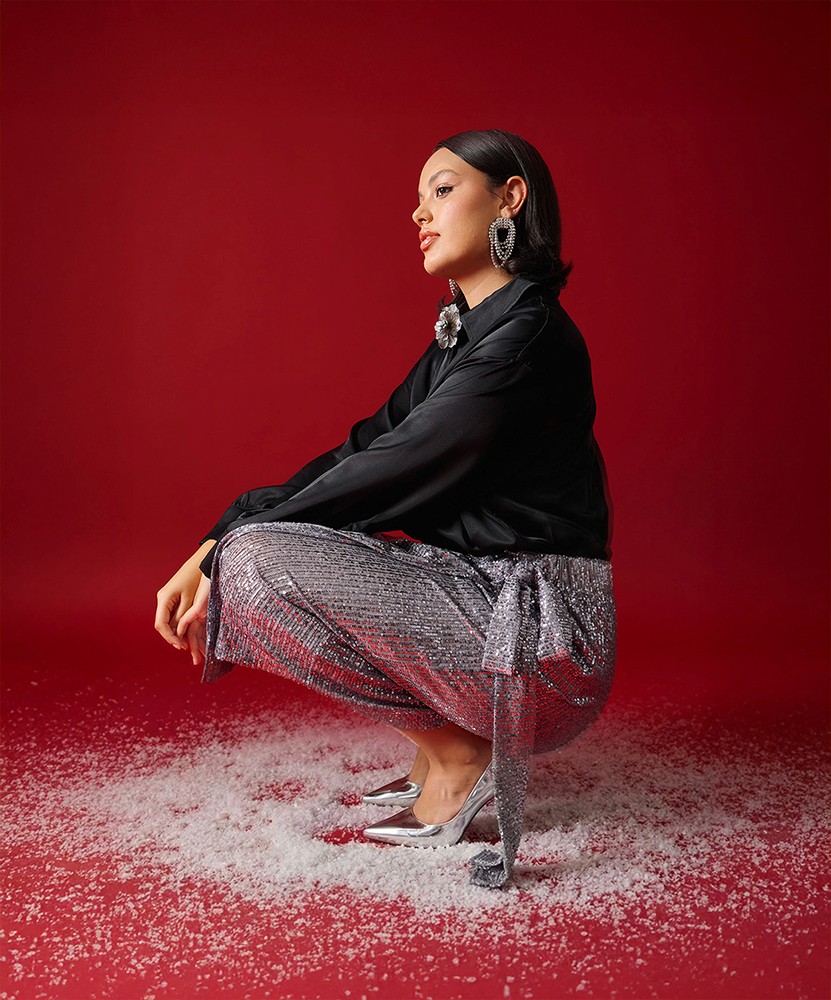 Streetside billboard with flyposters of the Batch.Works brand and illustrations