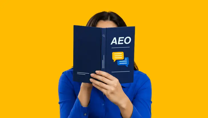 Person holding a blue book with AEO text and speech bubbles against a yellow background.