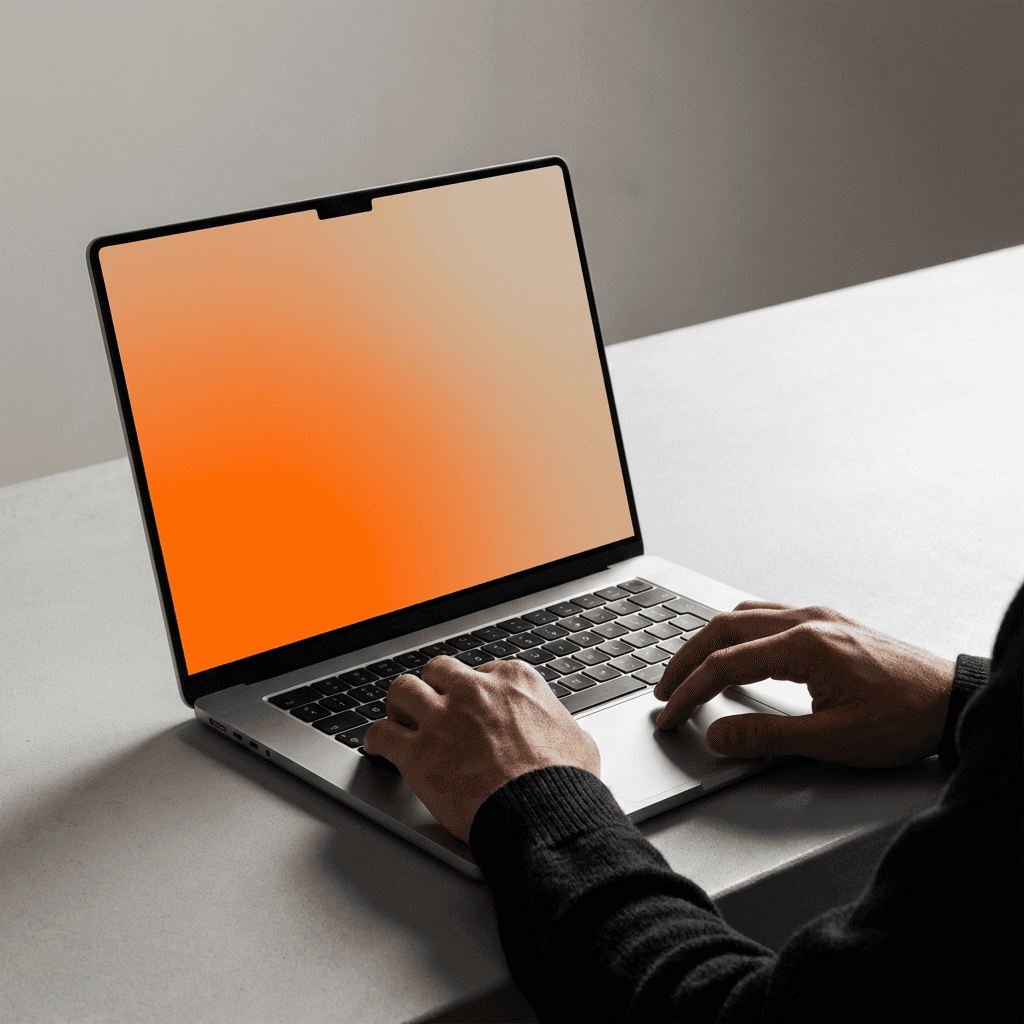 silver iMac turned on inside room