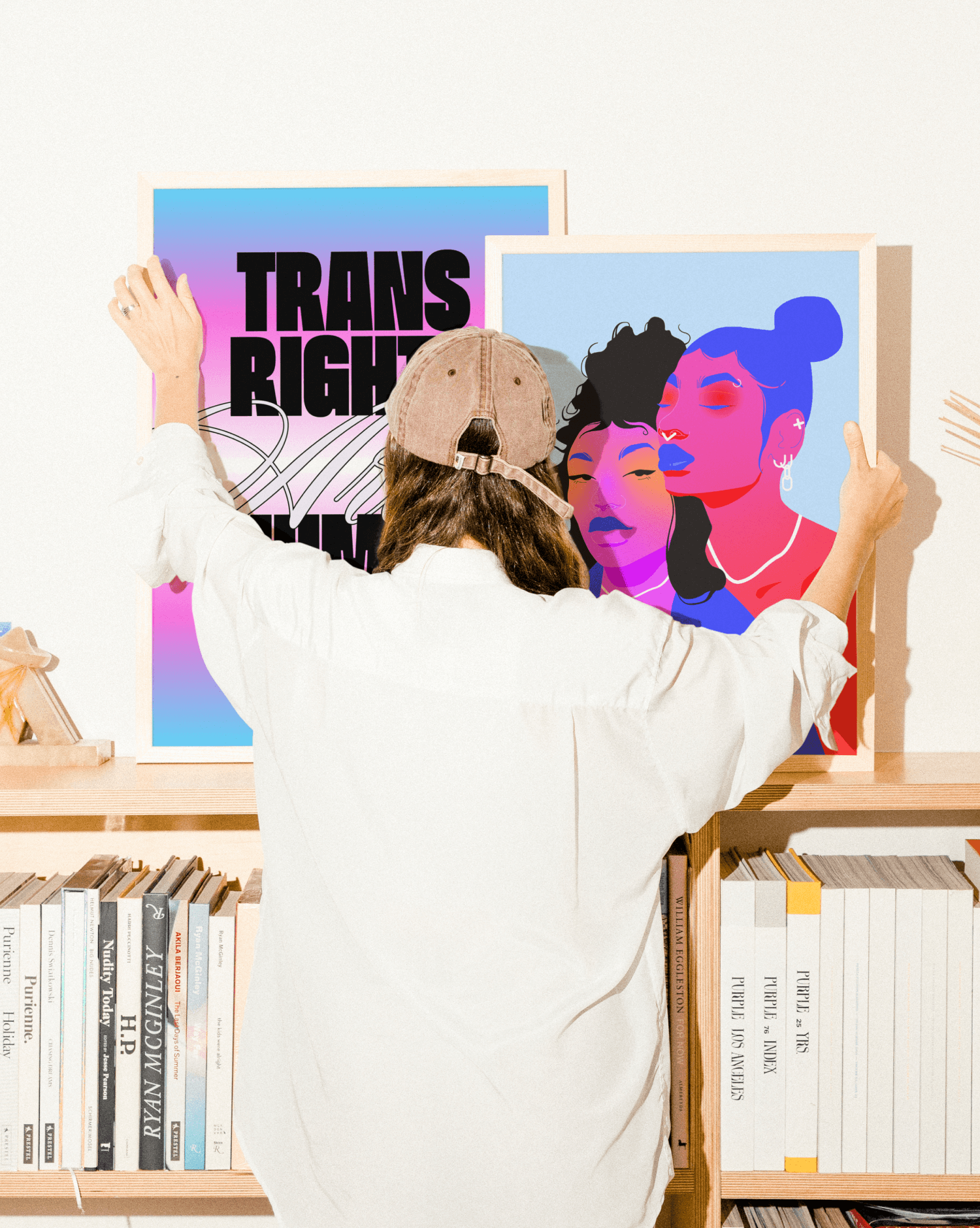 Streetside billboard with flyposters of the Batch.Works brand and illustrations