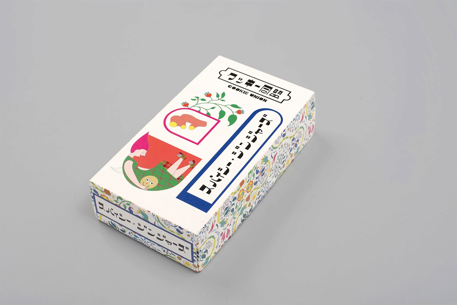 Cookie Union packaging box featuring bright cartoon-inspired illustrations and graphic patterns. Ginger flavor
